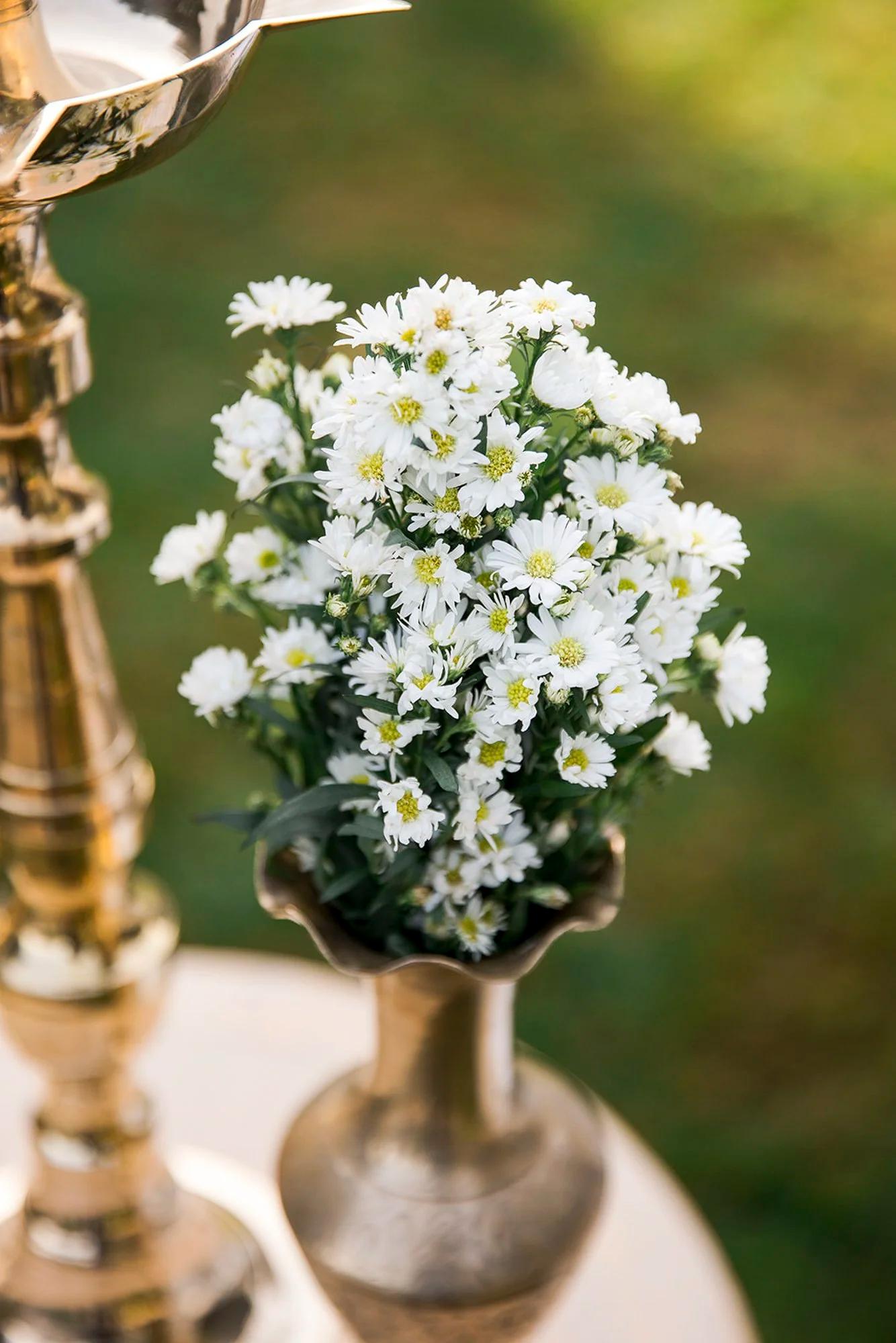 Ceremony structure with floral details at a California wedding