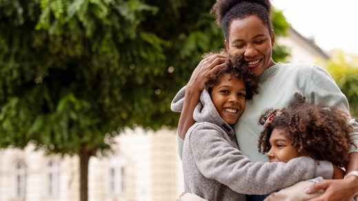 mother and children hugging