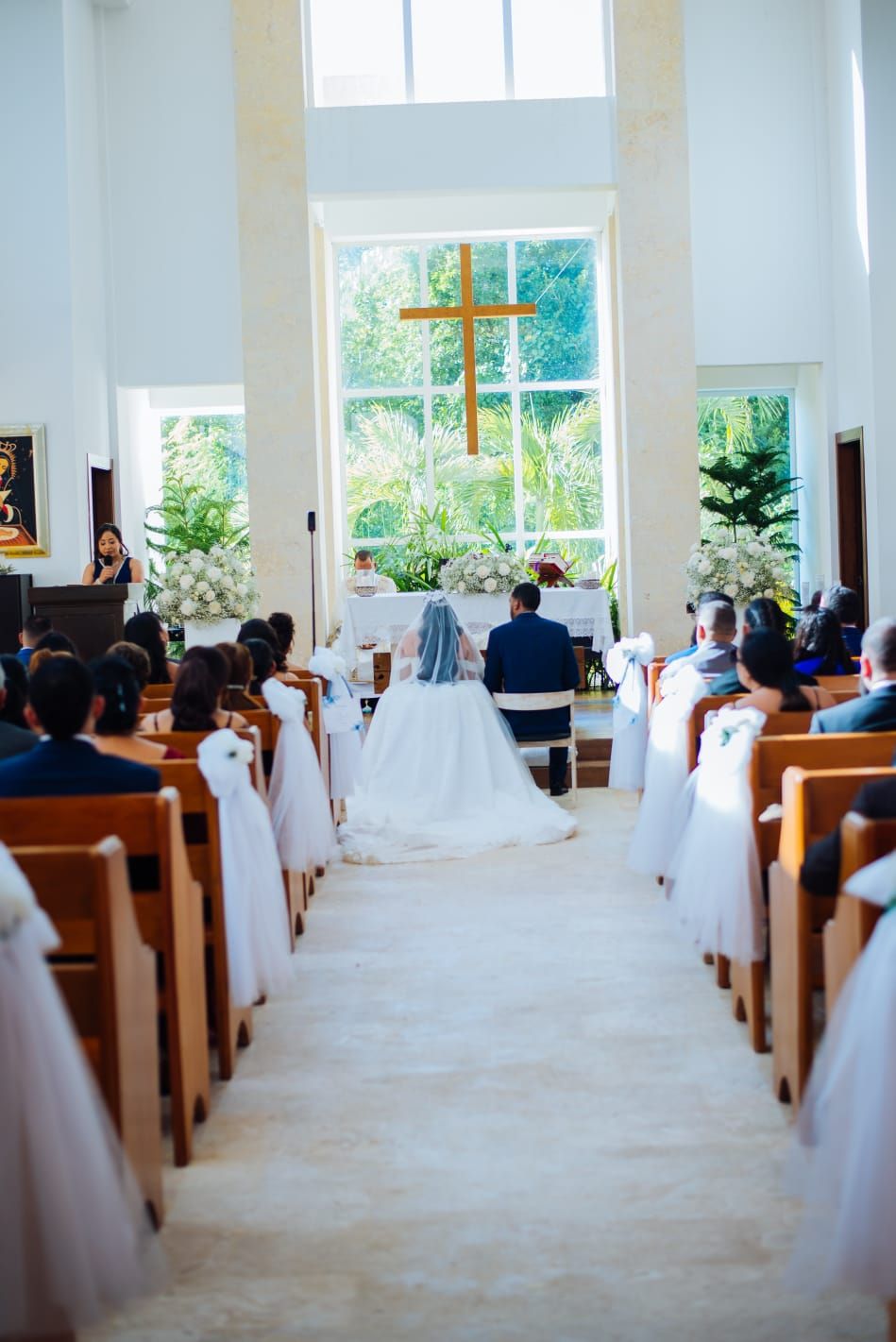 Wedding ceremony inside a Punta Cana chapel with the couple at the altar