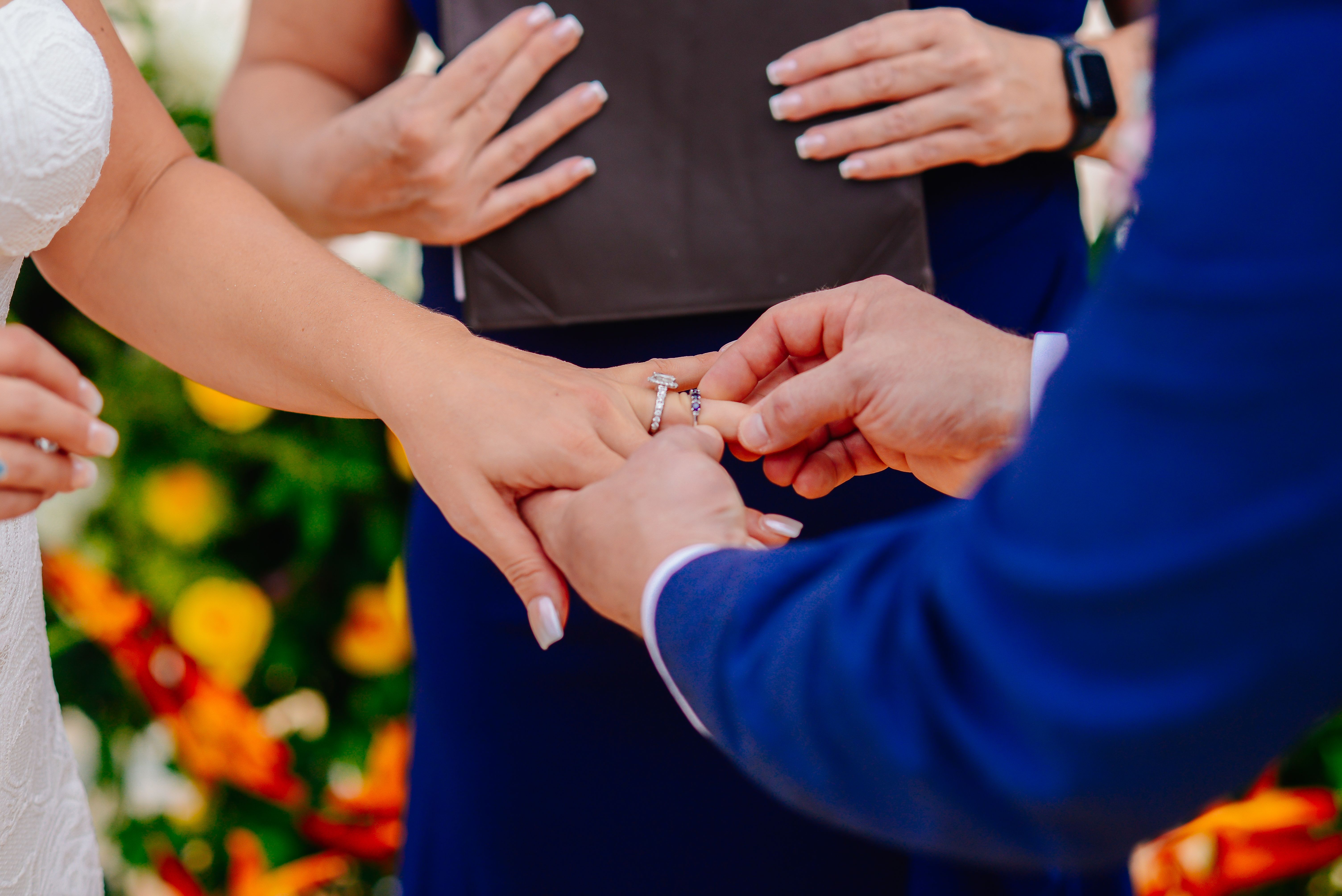 Groom placing a wedding ring on the bride during a Punta Cana ceremony