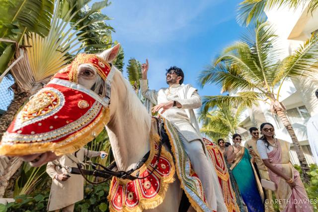 The groom arriving on horseback — Punta Cana