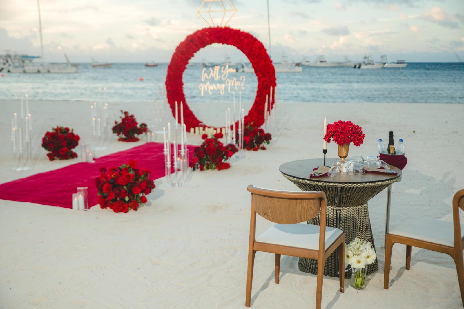 Endless Love: Red ring proposal decoration with the optional dinner table by the sea. Endless Love: Red ring proposal decoration with the optional dinner table by the sea.