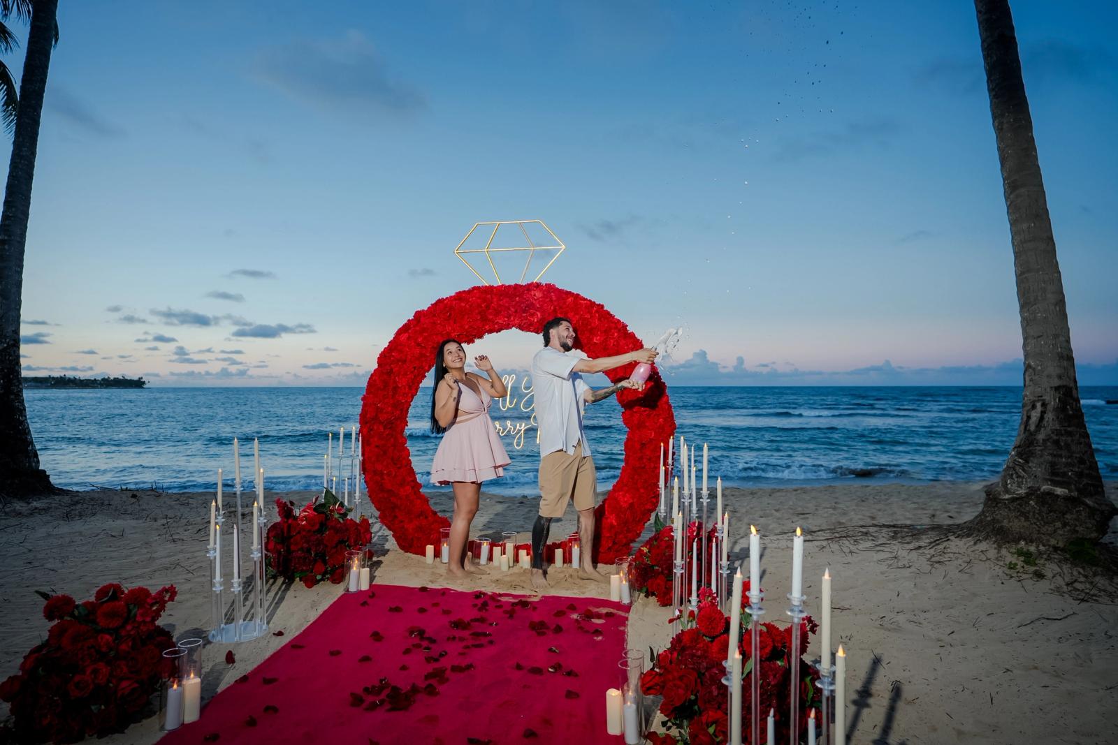 Endless Love: Front view of the red floral ring and beach aisle. Endless Love: Front view of the red floral ring and beach aisle.