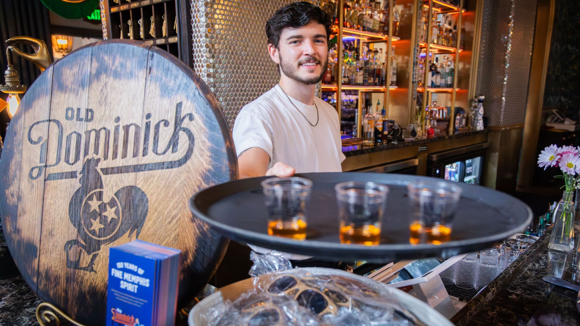 Connor Christie, Bellhop GM, serving up Old Dominick's Tennessee whiskey and bourbon