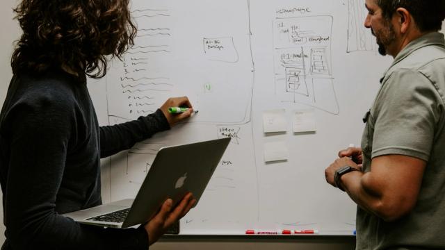 Business consultant leading an automation process mapping session