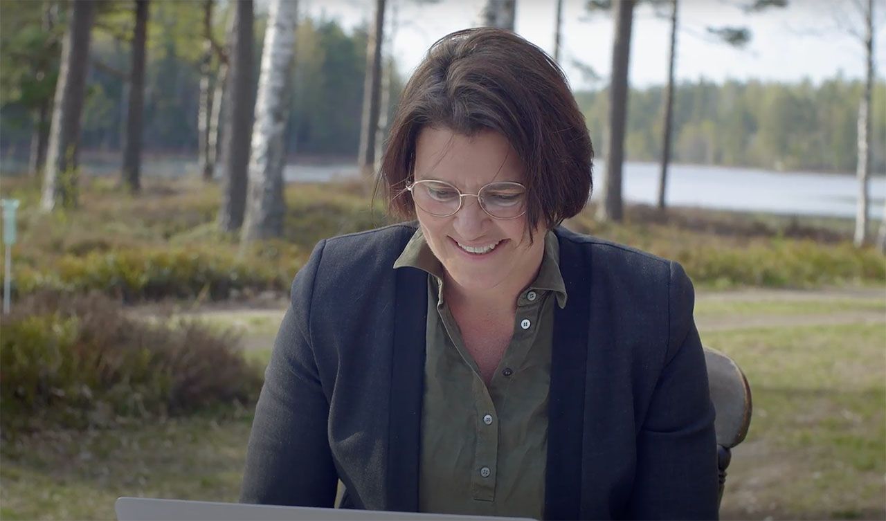 Pernille Brun, Session's Founder and CEO, sitting in a forest in Sweden where Session was founded