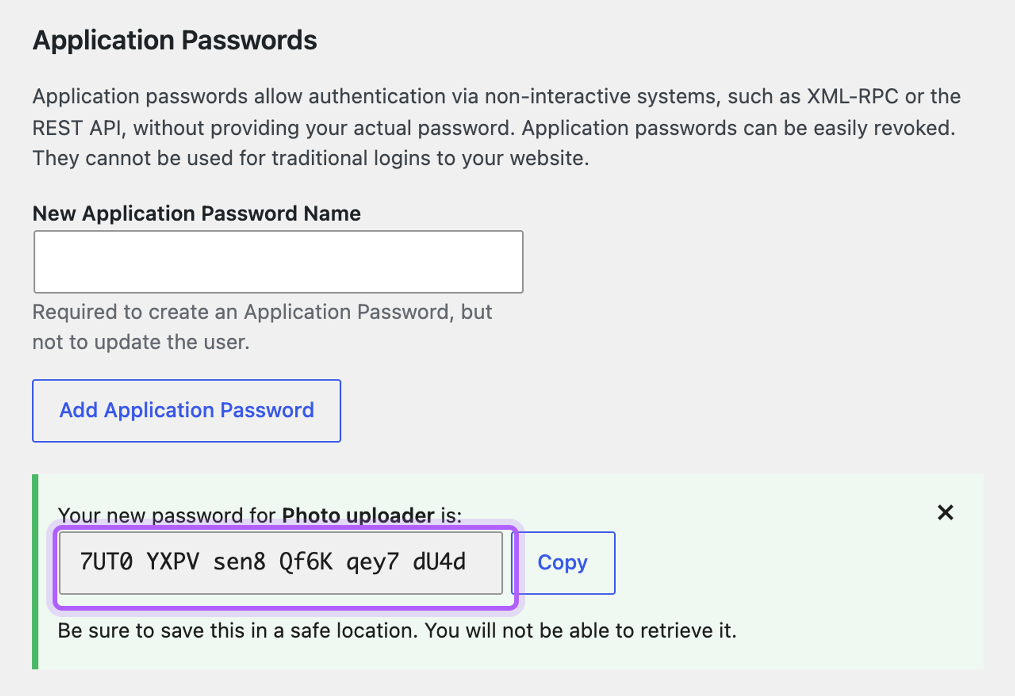 The message Your new password for Photo uploader is, followed by the generated application password in a field, which is highlighted, and a Copy button
