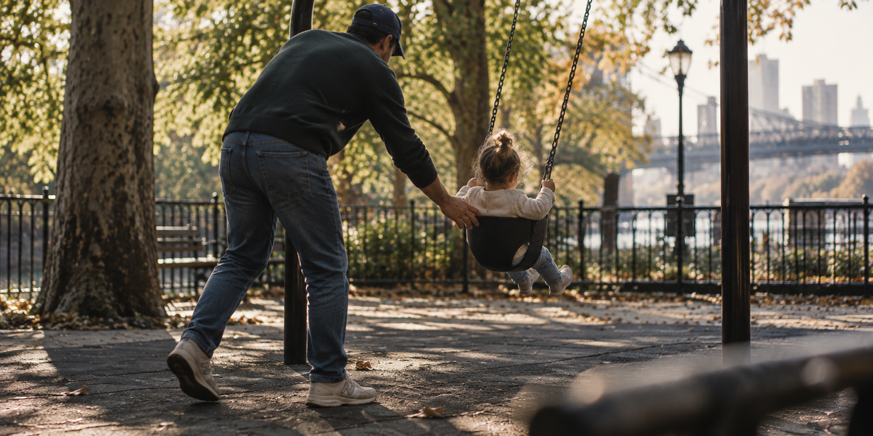 A father pushing a stroller down a Brooklyn street on a Saturday morning