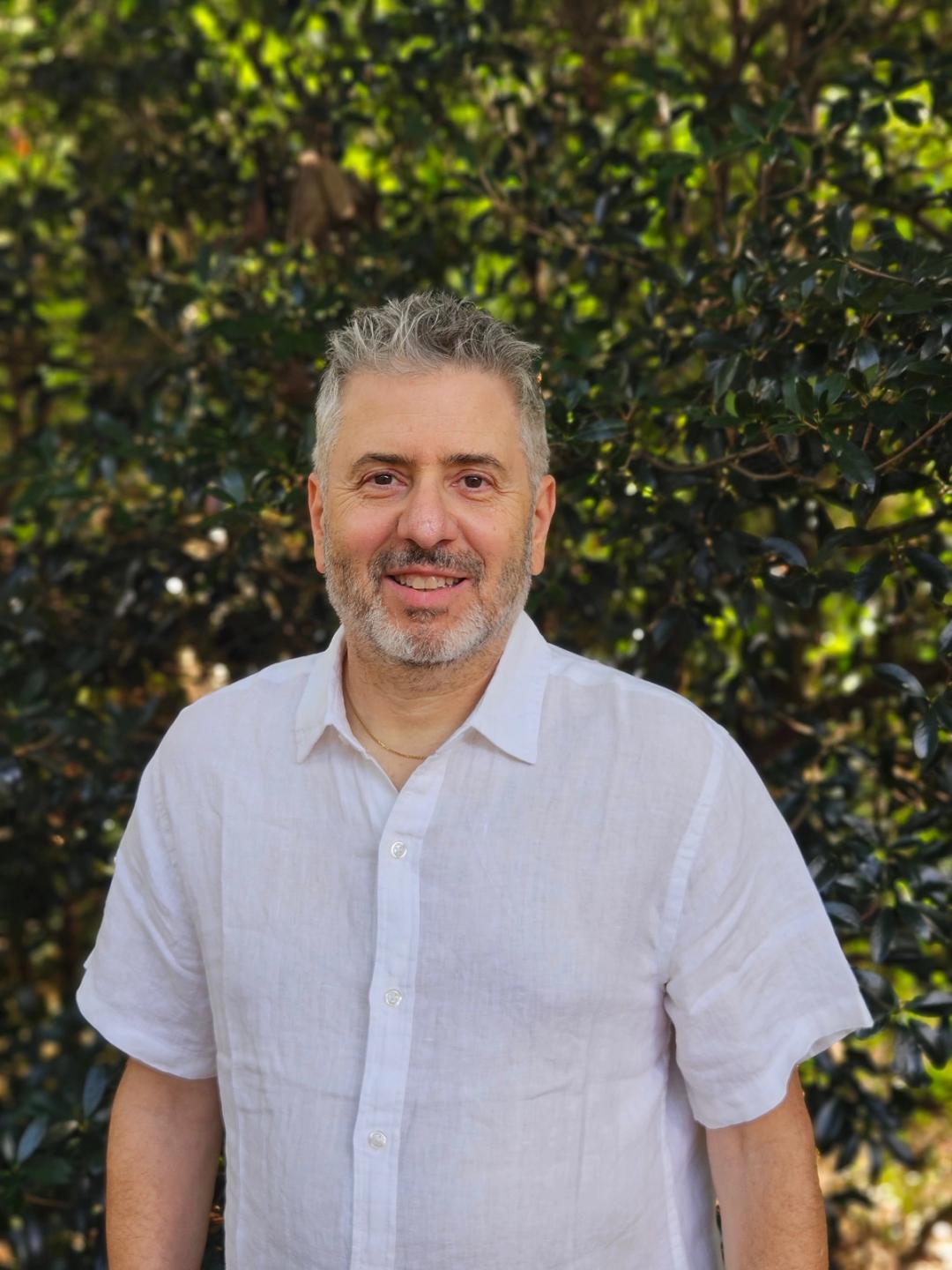 Steve Mandel smiling outdoors in Metro Atlanta