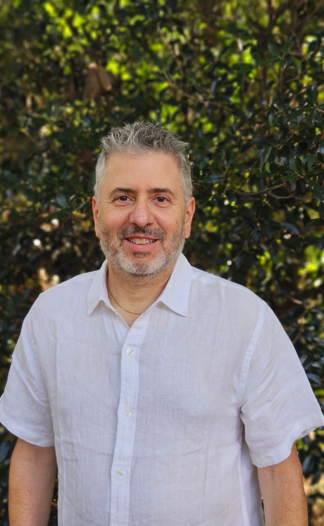 Steve Mandel smiling outdoors in Metro Atlanta