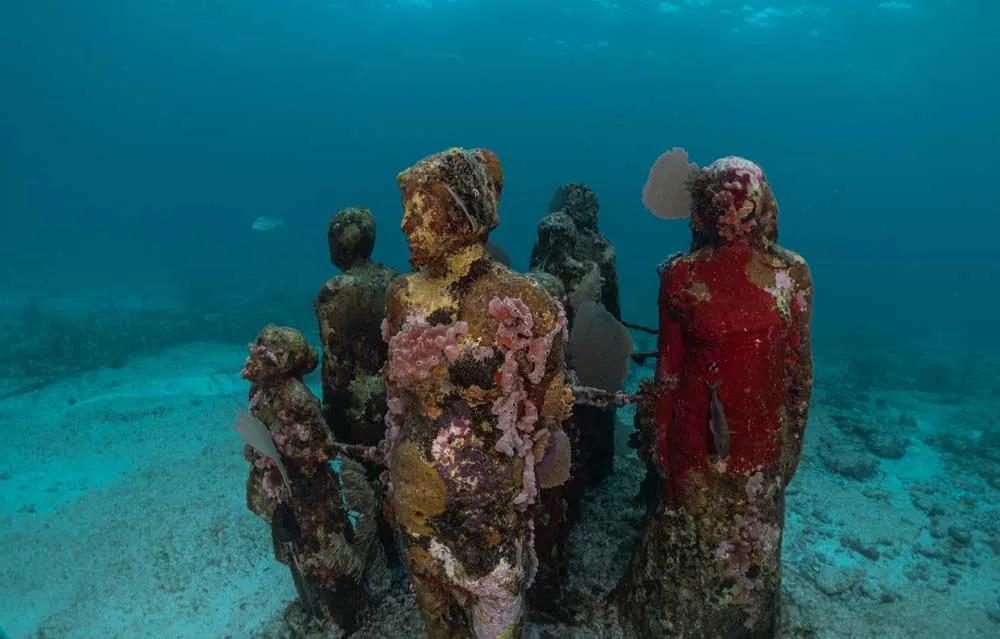 statues inder waster in MUSA, Mexico