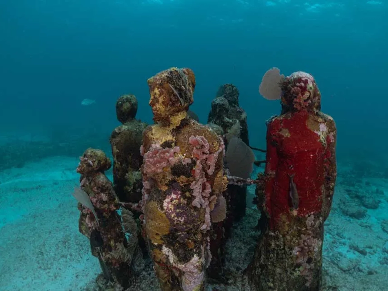 statues inder waster in MUSA, Mexico