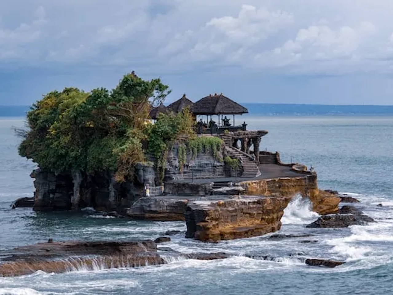 a wood cabin in the middle of the ocean indonesia