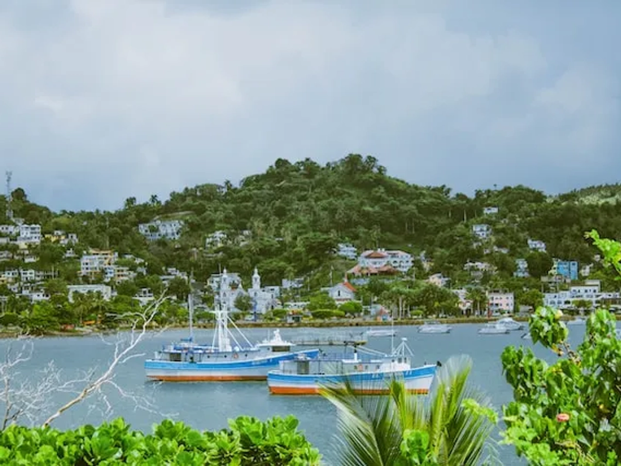 boats on a river in the dominican republic