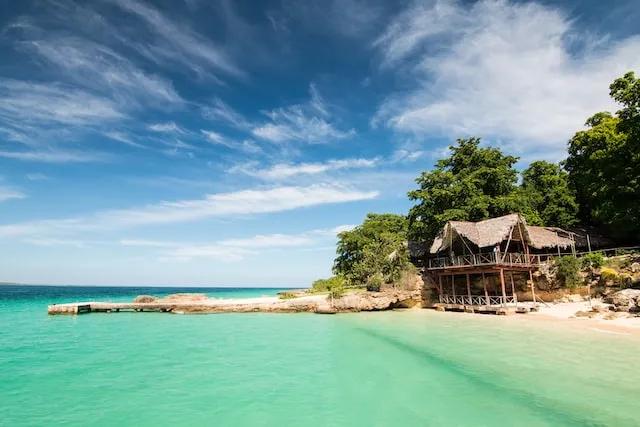 a small house on a bech in cuba