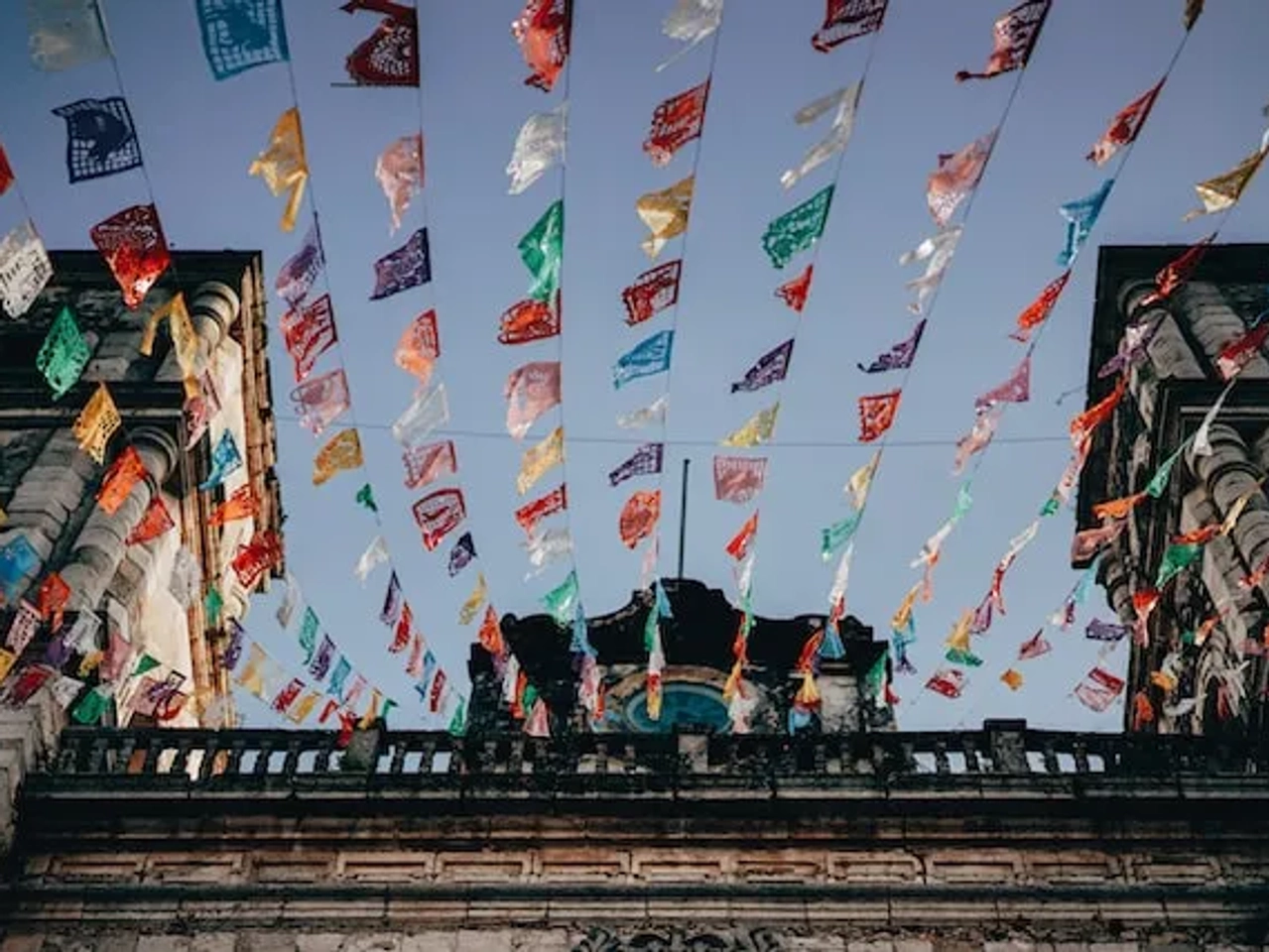flags on a street in mexico