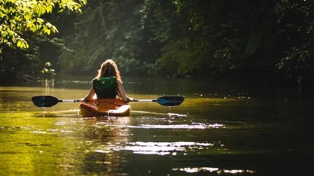 girl kayaking in Drake Bay, Costa Rica