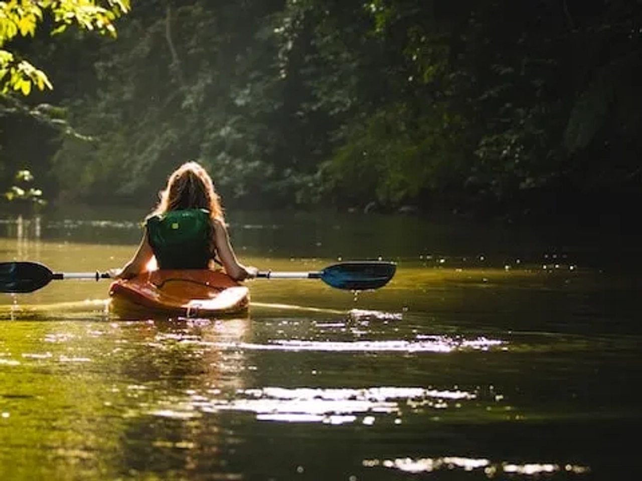 girl kayaking in Drake Bay, Costa Rica