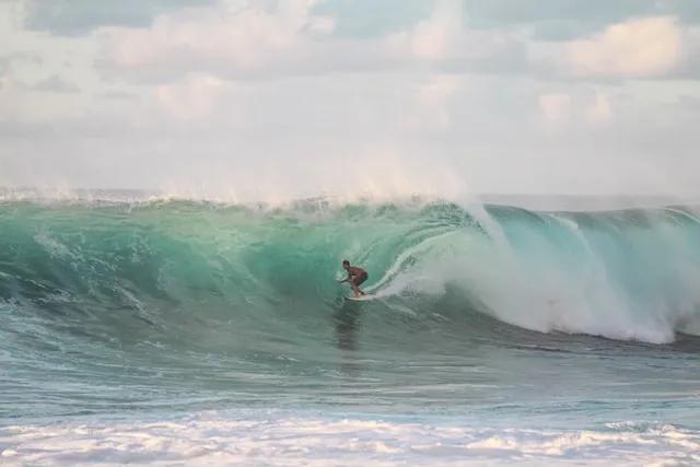 man surfing in Hanauma Bay in hawaii
