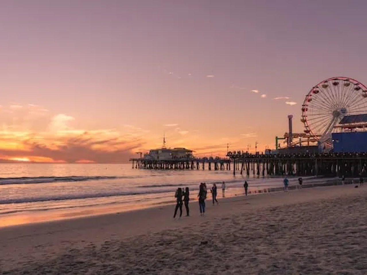 people in santa monica at sunset in california, USA