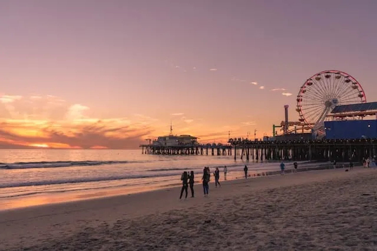 people in santa monica at sunset in california, USA