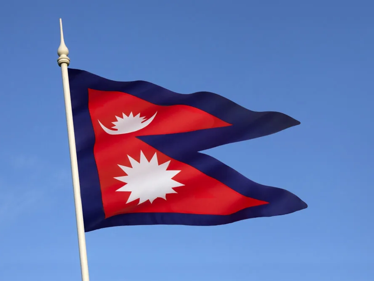 bandeira triangular do nepal ao vento
