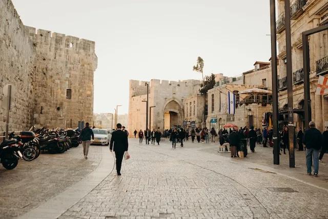 people walking in old town jerusalem in israel