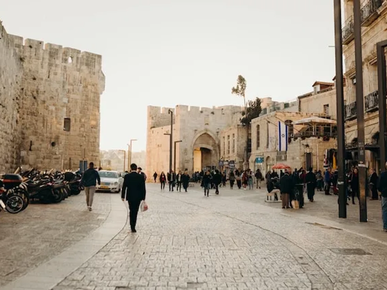 people walking in old town jerusalem in israel