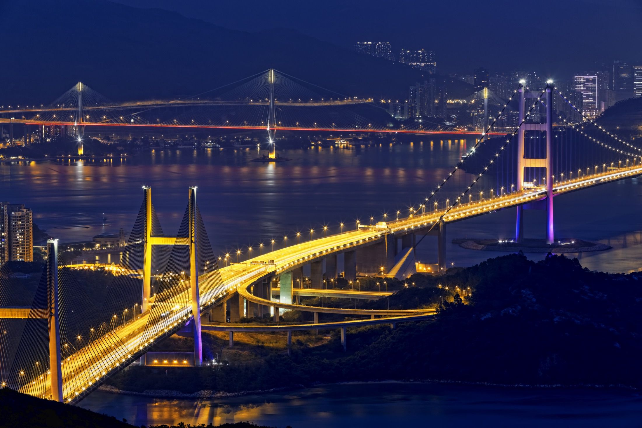 Illuminated bridge infrastructure representing public-private delivery