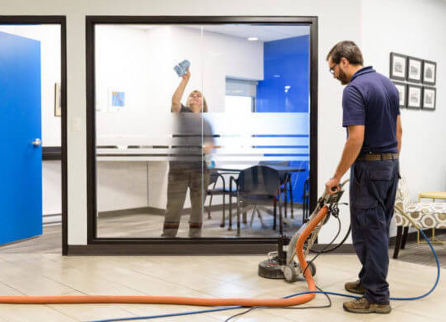 Cleaners maintaining an office