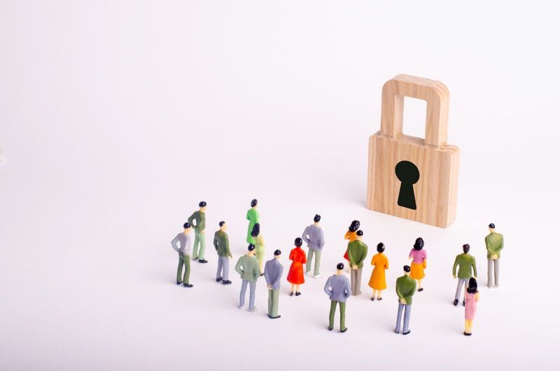 2022 Risk Assessment RFP A crowd of people looks at the padlock image used by The Bid Lab's Feature Bid page for a cybersecurity risk assessment RFP.
