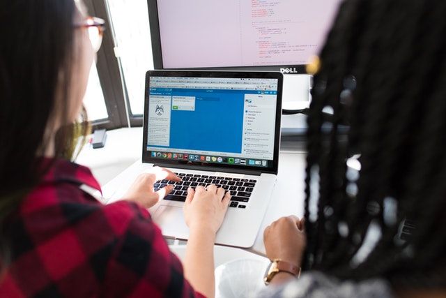 web-based learning management system with two students