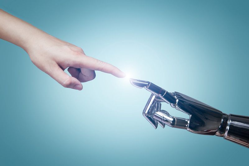 Human hand touching with robot