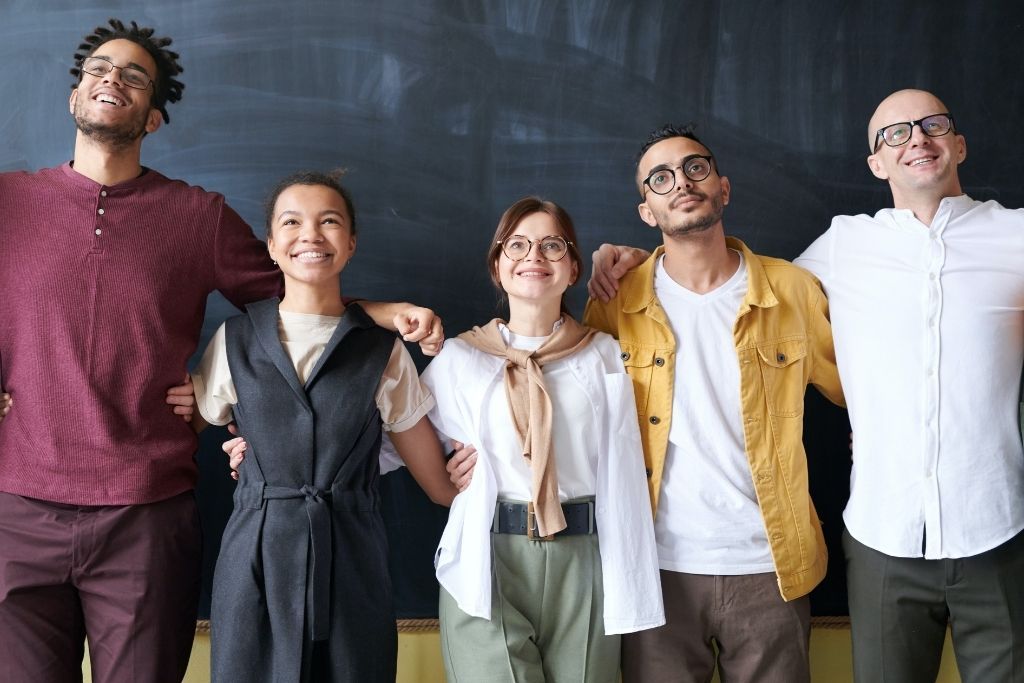 Diverse group of young men and women looking for an apprenticeship.