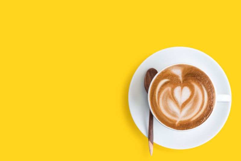 New Hampshire RFP A cup of latte on a sunny yellow background