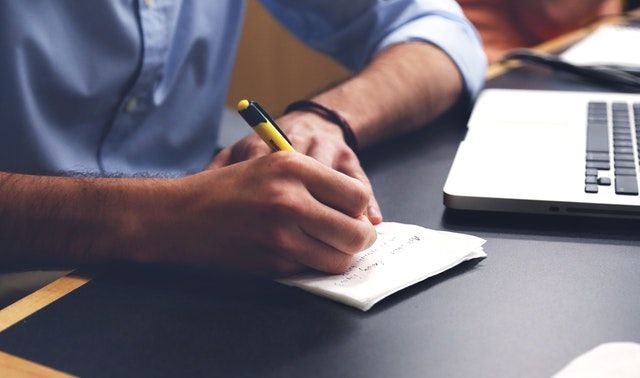 man with checklist for his RFP layout