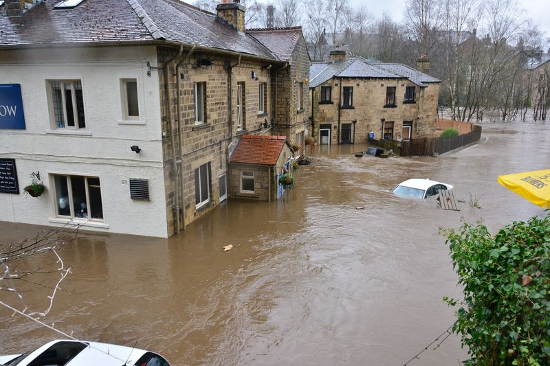 The family told the story of going through the day as if everything was okay, believing the media when they said that there was no imminent threat since the river was miles away. While cooking a meal, the flood waters came.