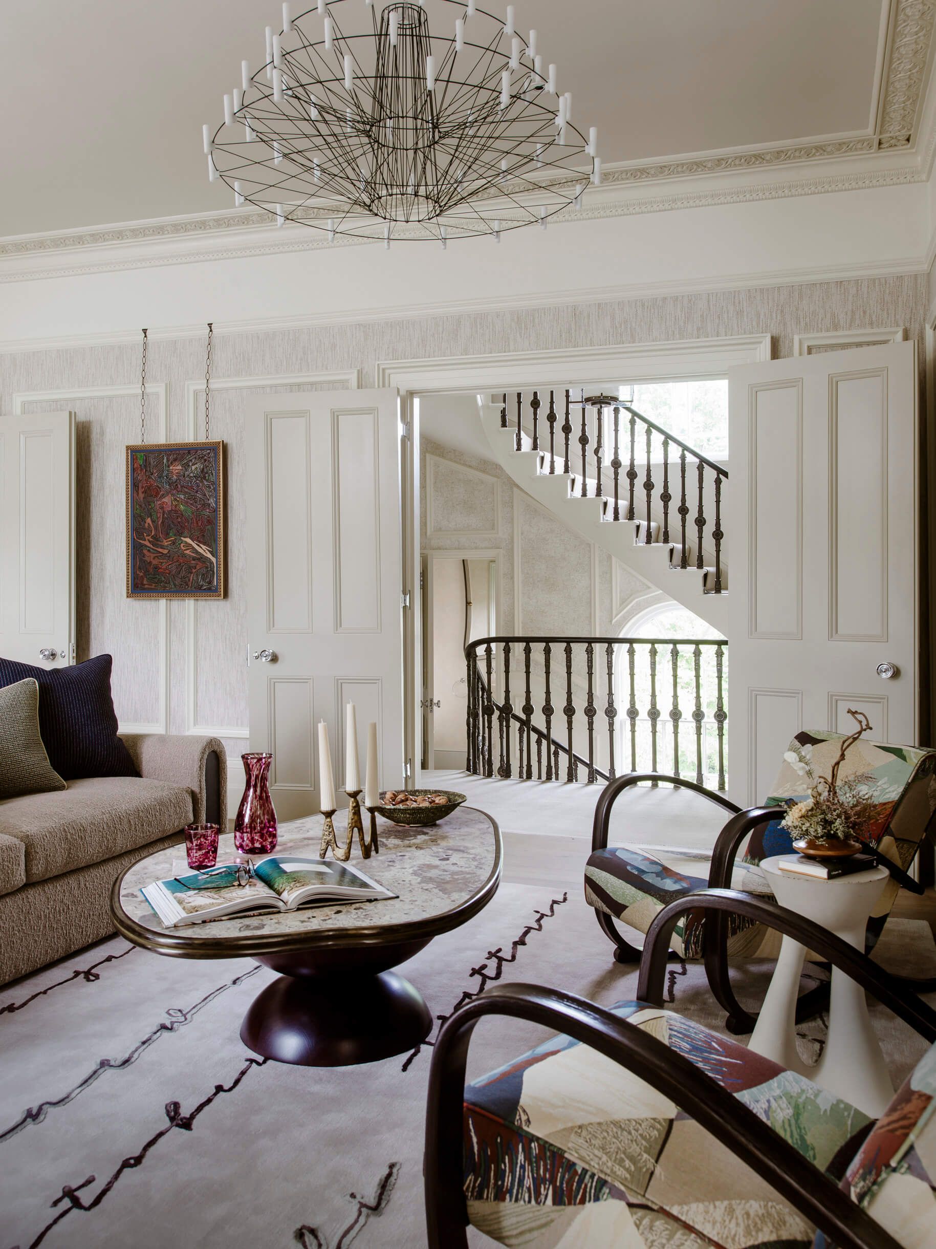 Living room with staircase in the background