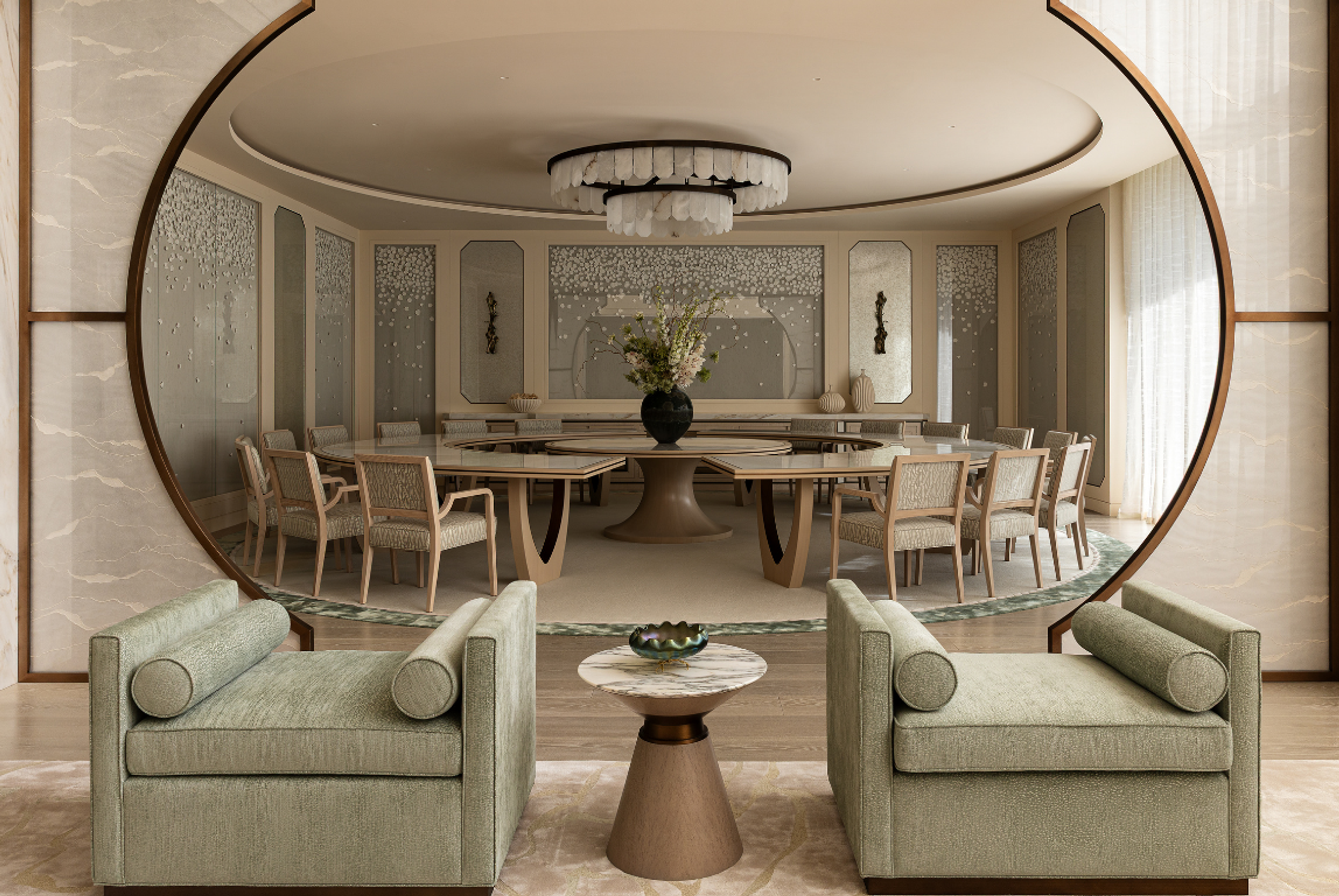 Elegant circular dining room interior framed by an architectural arch, featuring a sculptural chandelier, custom round dining table, tailored chairs and soft neutral finishes in a refined contemporary interior design scheme.
