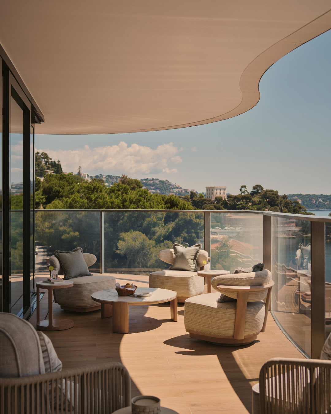 A curved terrace with a sea view at the Monaco Retreat