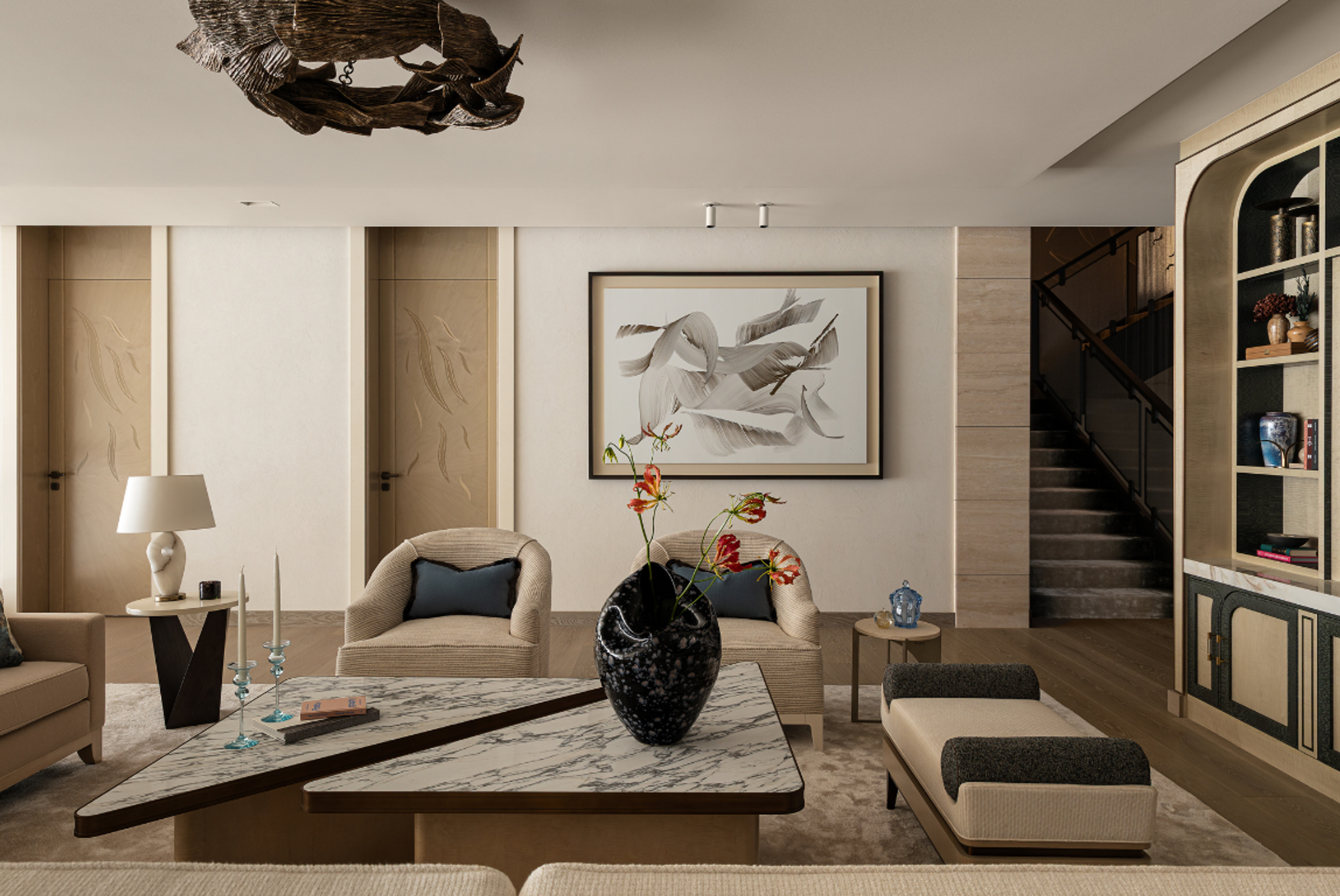 Dubai family villa living area with sculpted seating, marble coffee table, curated art and a calm, layered atmosphere.