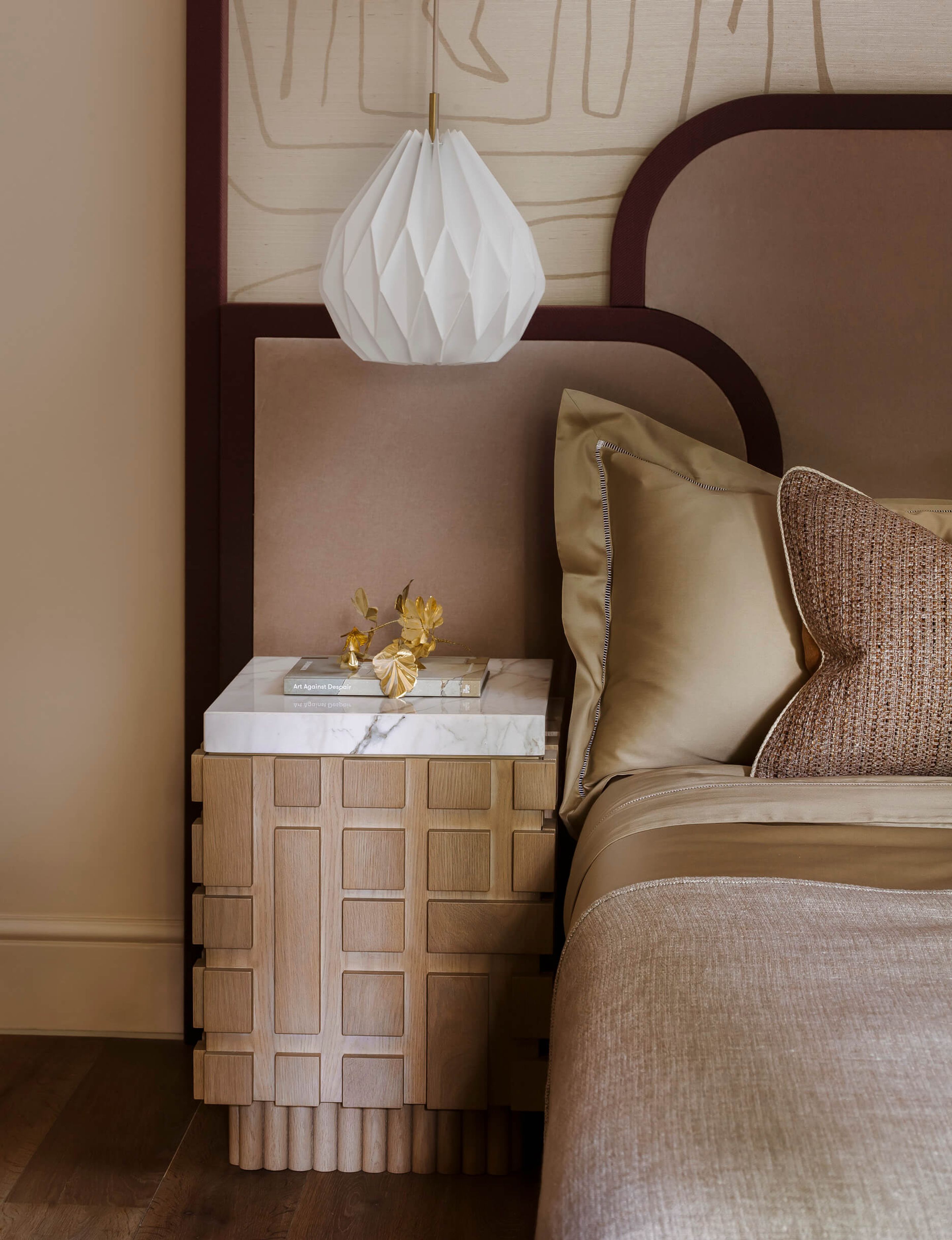 Bedside table, lamp and bed