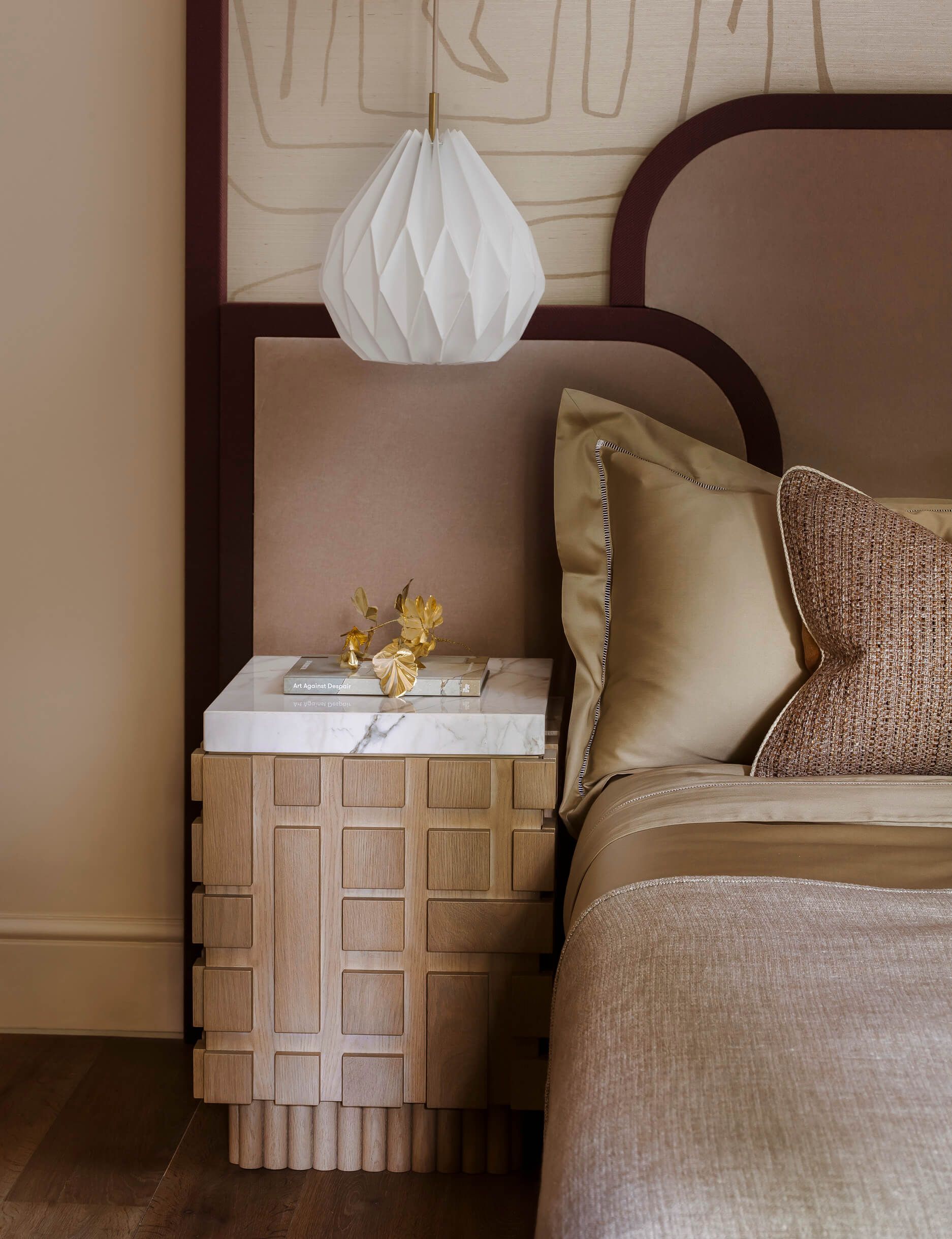 Bedside table, lamp and bed