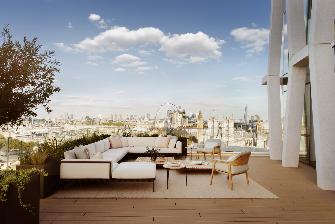 Expansive rooftop terrace with outdoor lounge seating and panoramic London views overlooking the London Eye in Westminster London luxury penthouse.