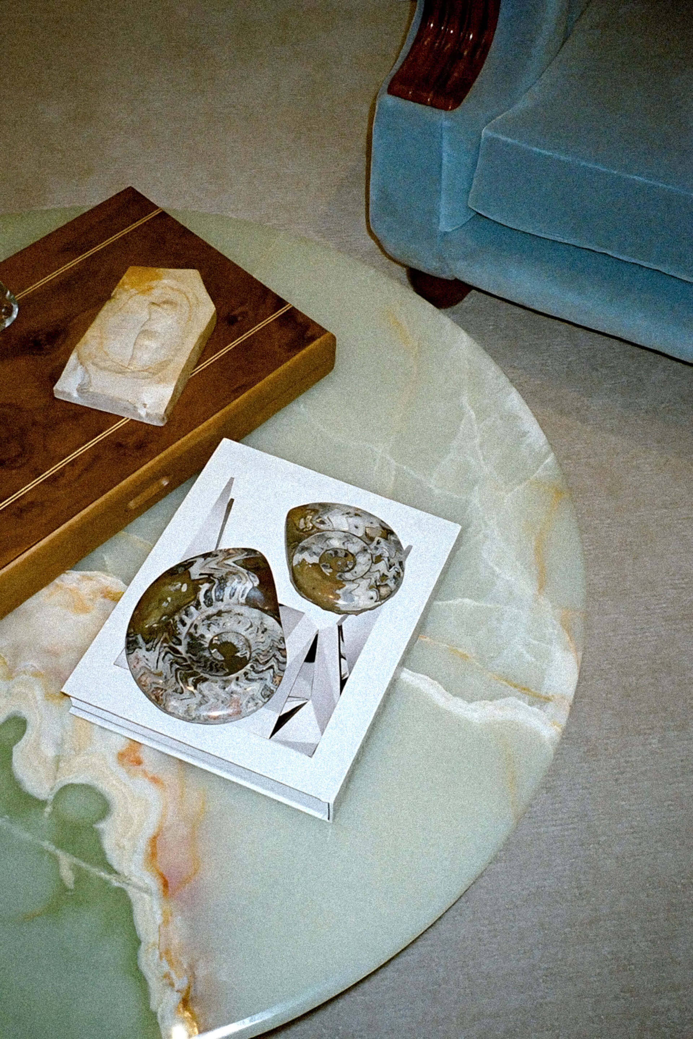 Coffee table with objects on it.