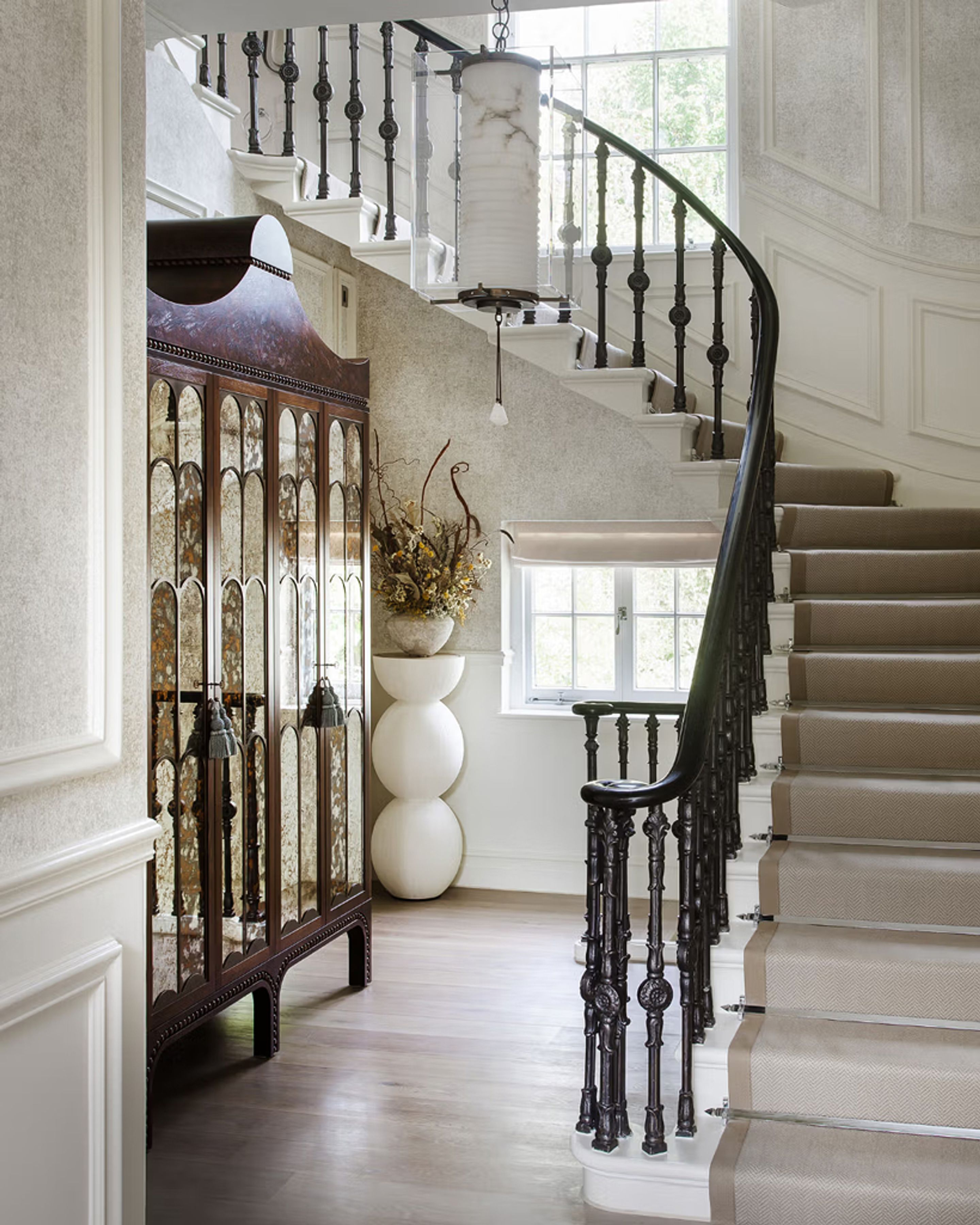 A staircase in the foyer of a home.