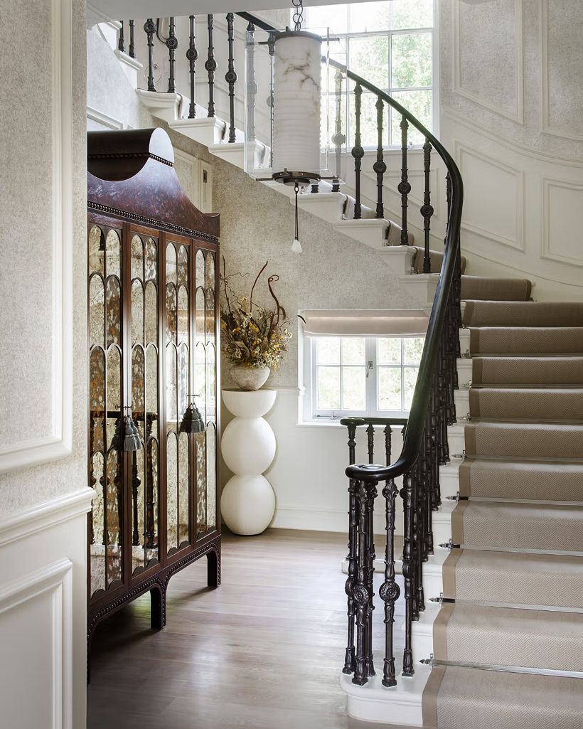A staircase in the foyer of a home.