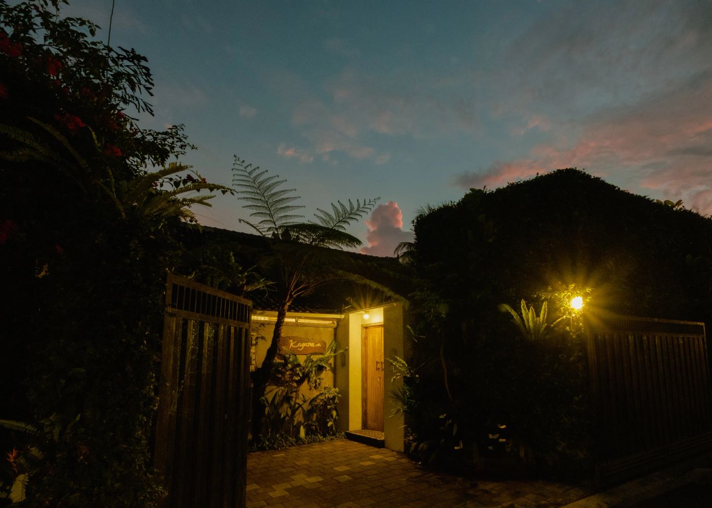 Villa exterior glowing at twilight