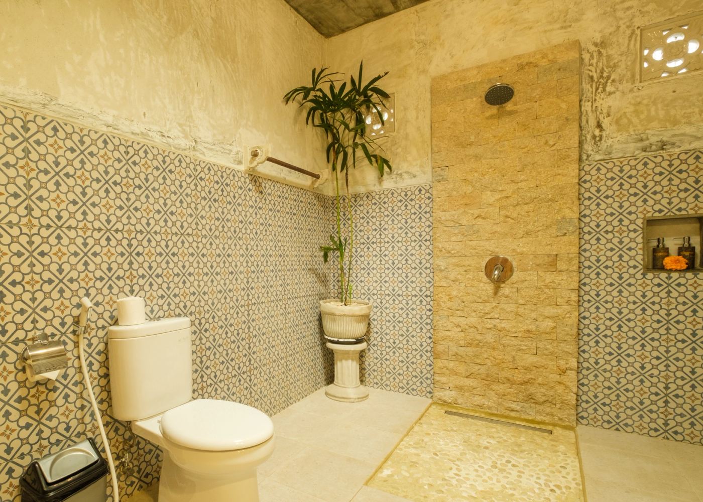 Bathroom with rain shower and Balinese tiles