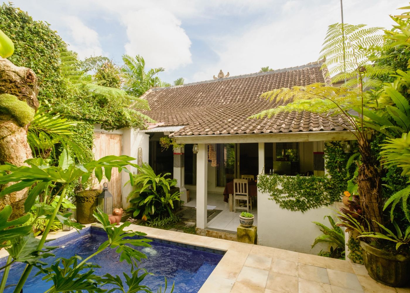 Private pool beneath the villa's Balinese tiled roof